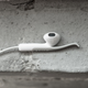 Illustration for article titled Sprng EarPod Clip Review: One of Apples Biggest Design Flaws, Fixed